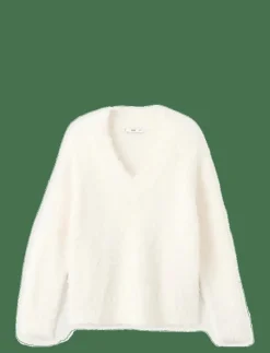 Faux-fur knitted sweater - Stickat