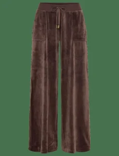 YUKA WIDE LEG TRACKPANT GOLD - Vida byxor